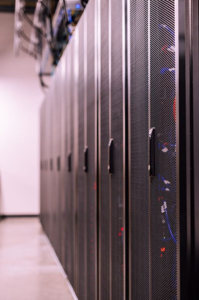 Server racks with fiber optic cables in a data center