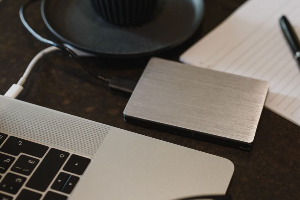 External hard drive connected to a laptop for backup